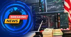 Breaking news alert with trading screens, stock charts, cash stacks, and a U.S. flag — highlights urgent financial market developments.